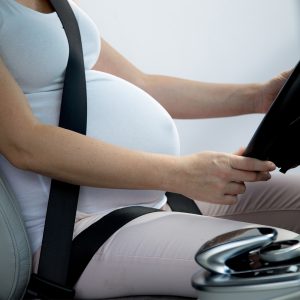 Pregnant,Woman,Belly,And,Safety,Belt,In,The,Car.