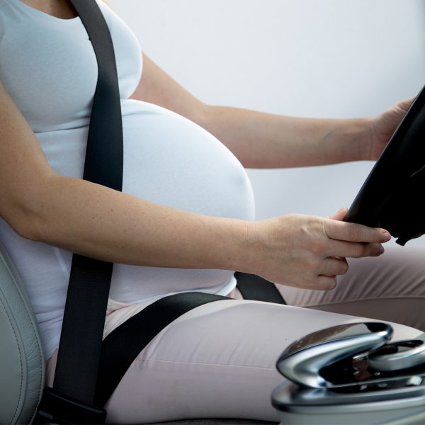 Pregnant,Woman,Belly,And,Safety,Belt,In,The,Car.